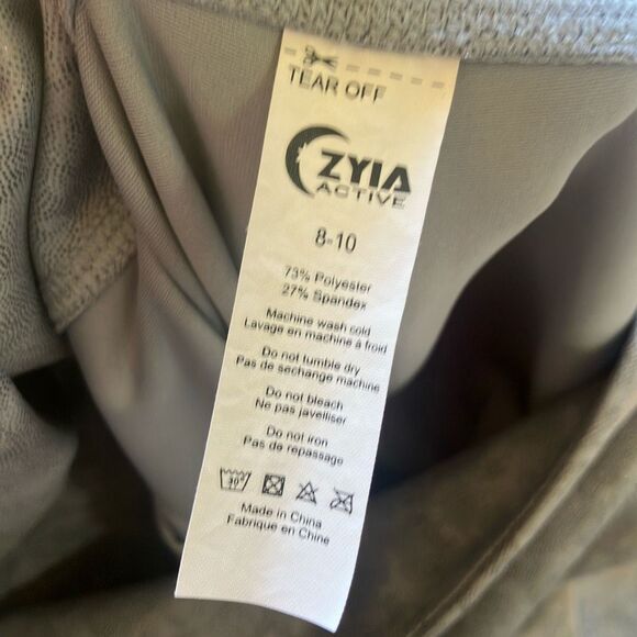 548. Zyia high rise silver metallic pocket leggings 7/8 size 8-10 - Picture 5 of 5